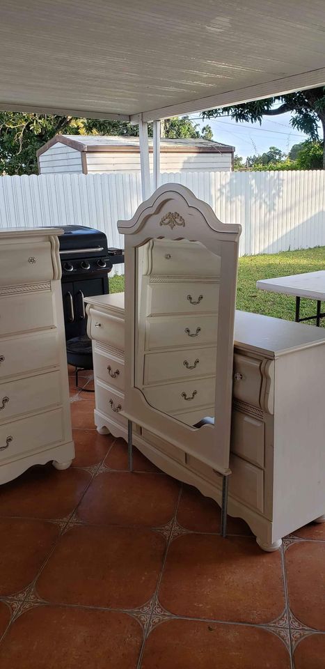 Set includes dresser, mirror, chest, nightstand and headboard